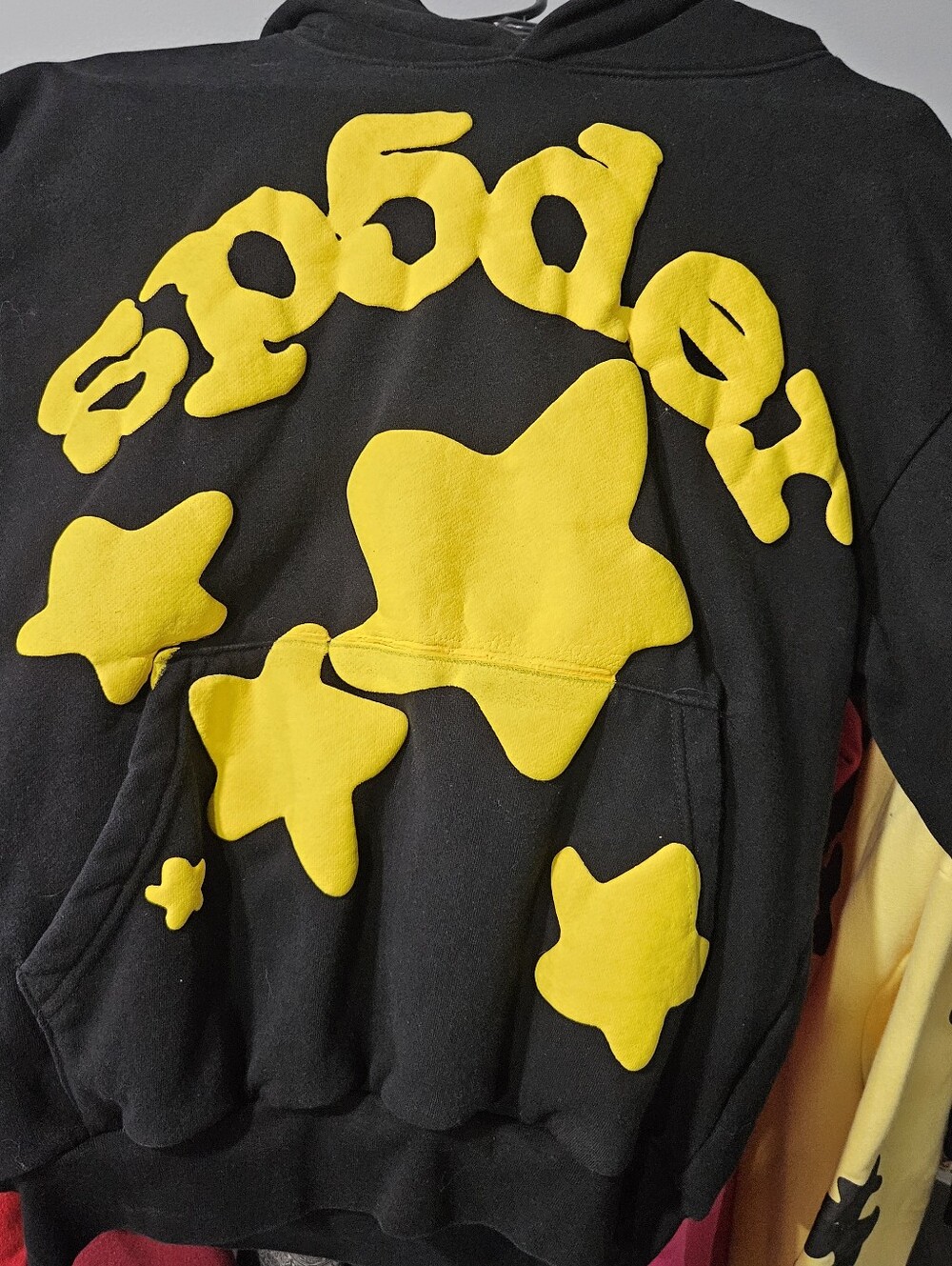 Sp5der Black Hoodie with Yellow Star Appliqués